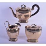 A 19TH CENTURY EUROPEAN SILVER SERPENT TEAPOT together with a similar tea caddy and cream jug. 1001