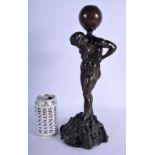 A 19TH CENTURY EUROPEAN GRAND TOUR BRONZE FIGURE OF ATLAS modelled leaning upon a naturalistic base.