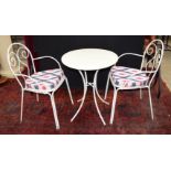 A metal garden table with two chairs with upholstered covers (3) 71 x 60 cm.