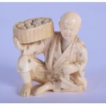 A MINIATURE 19TH CENTURY JAPANESE MEIJI PERIOD CARVED IVORY OKIMONO modelled holding fruit. 4 cm x 3