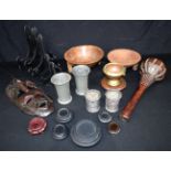 A miscellaneous collection including carved wooden bowls, wooden stands, a carved wooden African mas