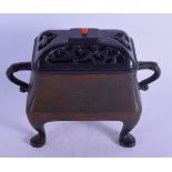 A CHINESE TWIN HANDLED BRONZE CENSER AND COVER 20th Century, bearing Xuande marks to base. 17 cm x 1