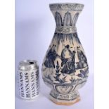 A CHINESE BLUE AND WHITE STONEWARE POTTERY VASE 20th Century, painted with figures within landscapes
