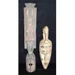 An African wooden Tribal Igbo mask together with another mask 67cm (2).