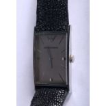 A BOXED EMPORIO ARMANI RAY SKIN WRISTWATCH. 35 grams overall. 2.75 cm x 3.75 cm.