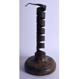 AN EARLY CONTINENTAL PIGS TAIL SPIRAL CANDLESTICK. 20 cm high.