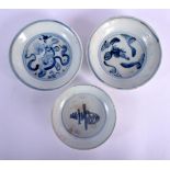 A PAIR OF 17TH CENTURY CHINESE BLUE AND WHITE PORCELAIN SAUCERS Ming, together with a smaller saucer