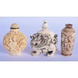 AN EARLY 20TH CENTURY CHINESE CARVED IVORY SNUFF BOTTLE AND STOPPER together with two others. Larges