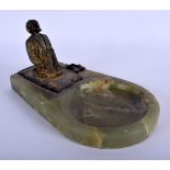 AN ANTIQUE COLD PAINTED BRONZE AND IVORY ONYX ASHTRAY modelled as a kneeling male. 18 cm x 8 cm.