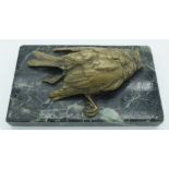 A small bronze bird by Jules Moigniez mounted on a marble plinth 5 x 14 cm.