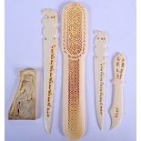 A 19TH CENTURY ANGLO INDIAN CARVED IVORY LETTER OPENER together with similar wares. Largest 24 cm lo