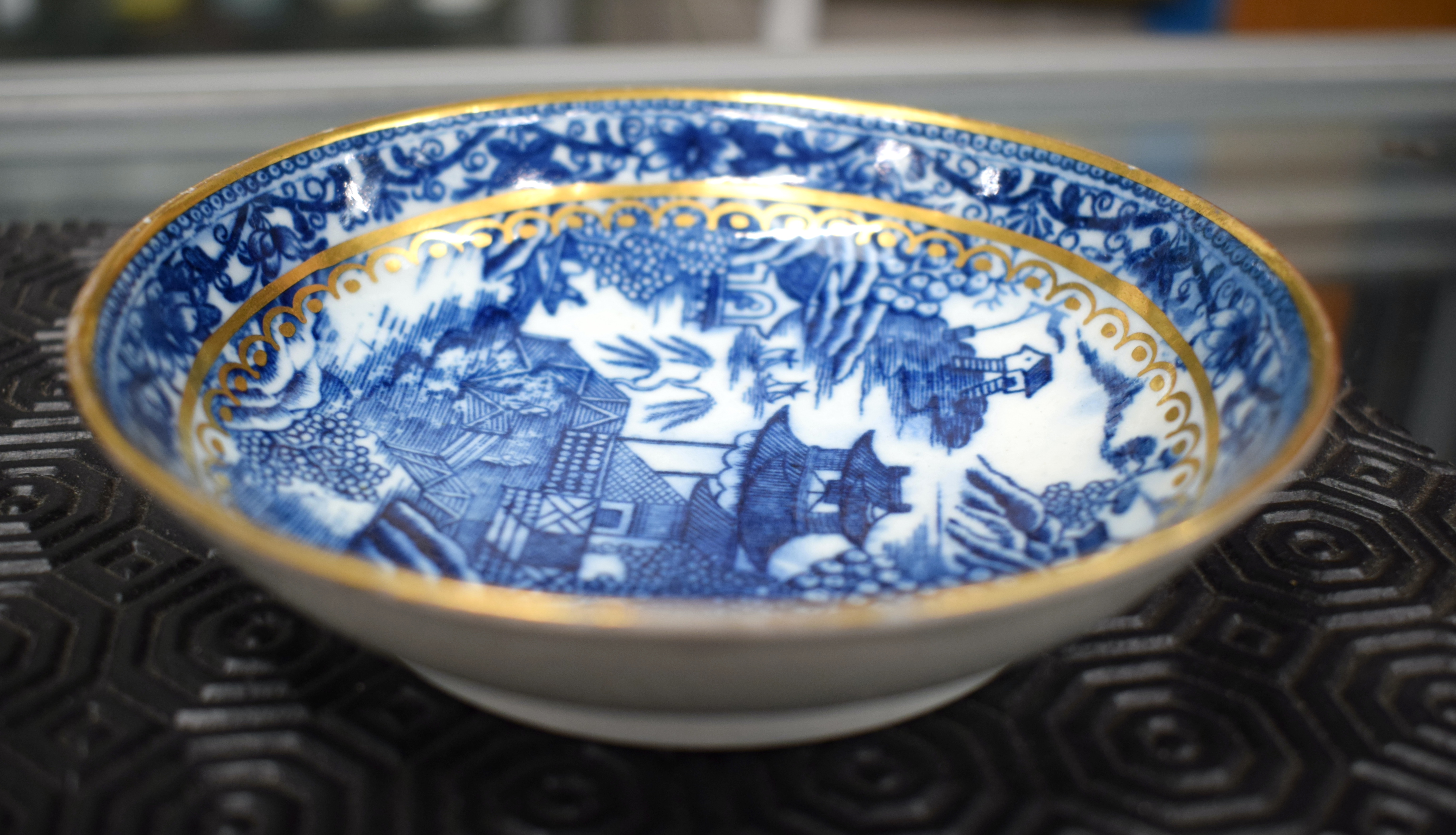 THREE LATE 18TH CENTURY CAUGHLEY BLUE AND WHITE CUPS, with a Caughley Fenced Garden Pattern Saucer - Image 4 of 12