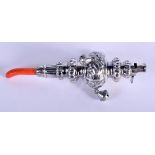 A CONTINENTAL SILVER BABIES RATTLE WITH CORAL TEETHER. 16cm x 4cm, weight 48g