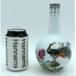 A small Chinese porcelain vase decorated in polychrome with calligraphy and a pheasant. 19cm