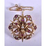 A 9CT GOLD BROOCH INSERT WITH RUBIES AND PEARLS. 2.9cm diameter. Weight 7.06g, hallmark London