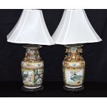A pair of Chinese porcelain polychrome vases converted to lamps 42 cm (2).