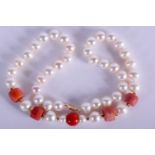 AN 18K PEARL AND CORAL NECKLACE. Length 44cm. Pearl 9.6mm diameter, Coral 10.9mm diameter. Weight