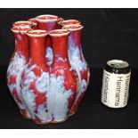 A Chinese porcelain flambe multi neck flower vase. 22cm