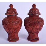 A PAIR OF 19TH CENTURY CHINESE CARVED CINNABAR LACQUER VASES AND COVERS Qing. 18 cm x 8 cm.