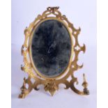 AN ANTIQUE FRENCH PALAIS ROYALE TYPE BRASS STRUT MIRROR engraved with flowers. 19 cm x 12 cm.