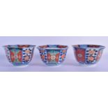 THREE 18TH/19TH CENTURY JAPANESE EDO PERIOD IMARI BOWLS painted with flowers. 12 cm wide. (3)