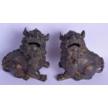A PAIR OF CHINESE BRONZE BUDDHISTIC LIONS AND COVERS 20th Century. 17 cm x 15 cm.