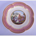 18th c. Sevres six lobed large dish painted with woman washing clothes in a river with a bridge in t