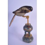 A VERY UNUSUAL 19TH CENTURY CHINESE CLOISONNE ENAMEL BIRD ON STAND Qing, modelled perched, overlaid