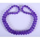 A CONTEMPORARY LAVENDER JADE NECKLACE. 70cm long, bead diameter 0.5cm