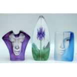 A Mats Jonasson glass sculpture of a female together with two other sculptures. 19cm (2)