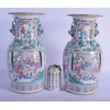 A LARGE PAIR OF 19TH CENTURY CHINESE CANTON FAMILLE ROSE VASES Qing, painted with figures and foliag