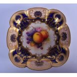 Royal Worcester dish painted with fruit under a cobalt blue and gilt ground by A. Shuck signed, date