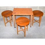 A retro small portable table with three stowaway fold up chairs .57 x 62 x 42cm.
