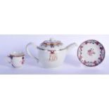 AN 18TH CENTURY CHINESE EXPORT FAMILLE ROSE TEAPOT AND COVER together with a similar cup and saucer.