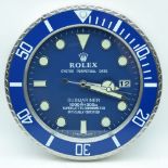 A contemporary Rolex dealership clock 34cm