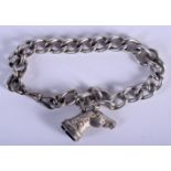 AN ANTIQUE SILVER CHAIN BRACELET WITH A HORSE HEAD SEAL. Length 21cm, seal 2.5 x 1.5cm, weight 41g