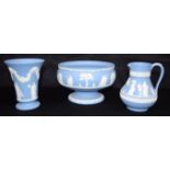 A Wedgwood Jasperware pedestal bowl, together with a jug and vase. 13 x 20cm (3)