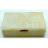 An Art Deco white onyx box by George Betjeman C1920. 5 x 17cm.