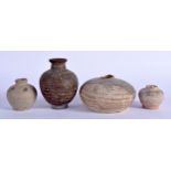 FOUR 15TH/16TH CENTURY SOUTH EAST ASIAN POTTERY VESSLES in various forms and sizes. Largest 9.5 cm h