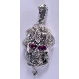 A SILVER SKULL PENDANT. 5.5cm long, 2cm wide, weight 13g