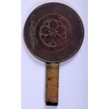 A SMALL 19TH CENTURY JAPANESE MEIJI PERIOD BRONZE HAND MIRROR decorated with a floral roundel. 12 cm