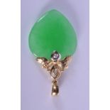 A 9CT GOLD AND APPLEJADE HEART SHAPED PENDANT. 3.5cm x 2cm, weight 4g