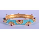 A BUCHERER ENAMEL BANGLE. Internal size 7.5cm x 6cm, weight 46g