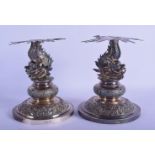 A RARE PAIR OF 19TH CENTURY CHINESE EXPORT SILVER DRAGON TAZZA BASES by Wang Hing, decorated with fo