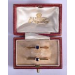 A PAIR OF ANTIQUE 15CT GOLD PINS EACH SET WITH A SAPPHIRE. 2.5cm long, weight of each pin 0.89g