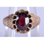 AN EDWARDIAN 9CT GOLD AND RUBY OR GARNET RING. Size P, hallmarked Coley Brothers Chester 1910, weig