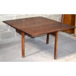 A large antique wooden fold down dining table 71 x 137 x 122cm .