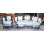 A RARE 19TH CENTURY ANGLO INDIAN CHINESE HARDWOOD SCROLLING SOFA with matching chair, decorated with