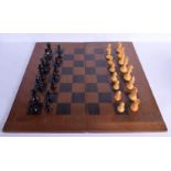 A VINTAGE STAUNTON PATTERN E P CHESS SET No 5 Size, together with an associated chess board. Largest