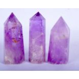 THREE VINTAGE AMETHYST OBELISKS. 11 cm high. (3)